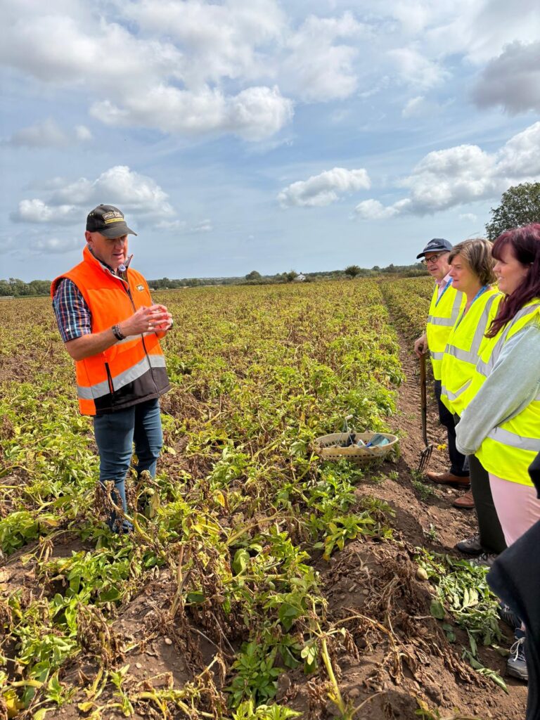 Richard from McCains showing the RCF team the potato field